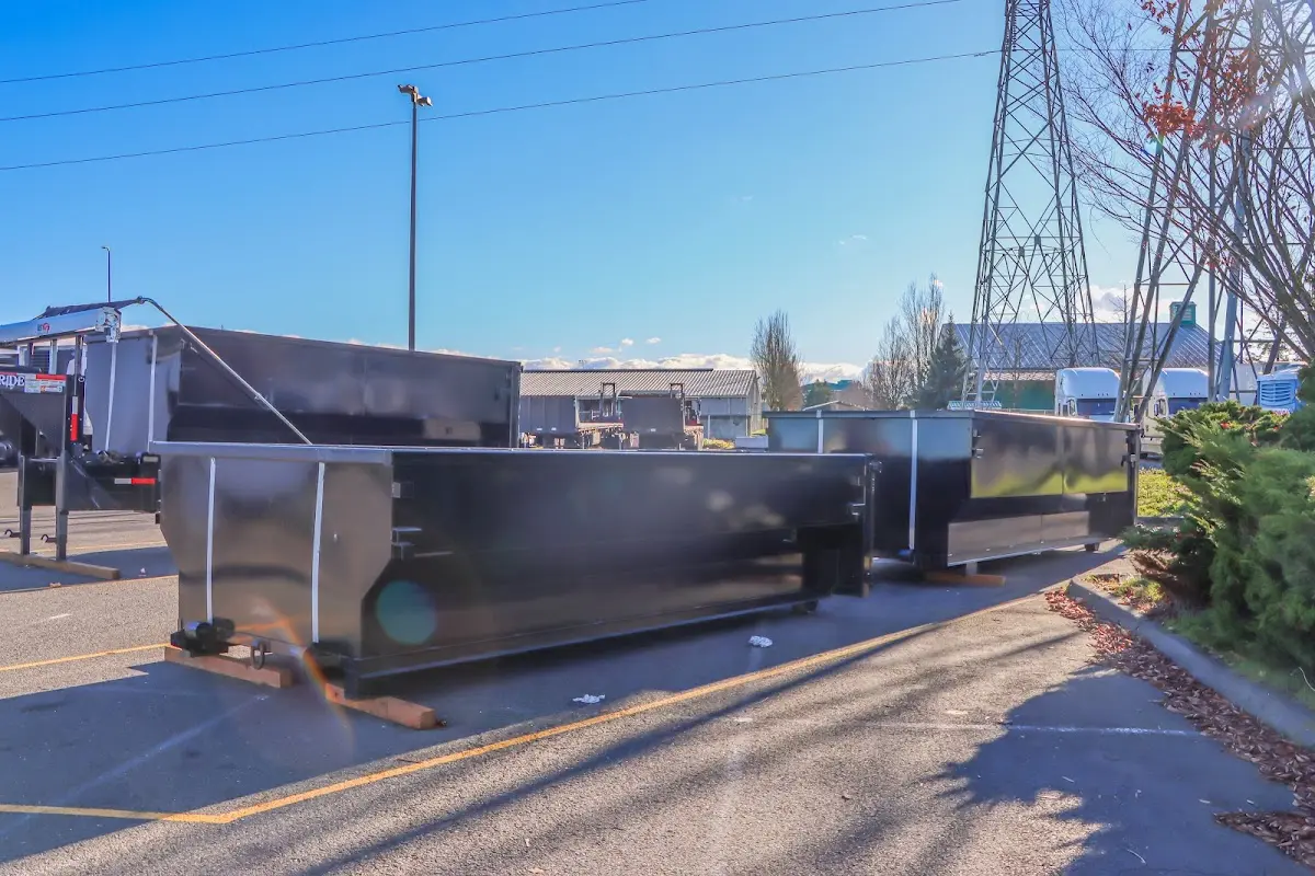 Roll-off dumpster ready for waste disposal at job site for Construction Dumpster Rental in Lake Barrington